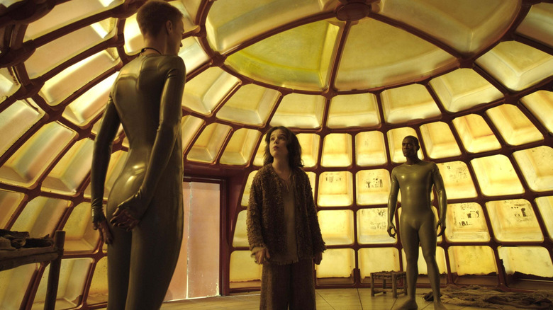 Father, Mother, and Campion speaking under a yellow glass dome in Raised by Wolves (2020)