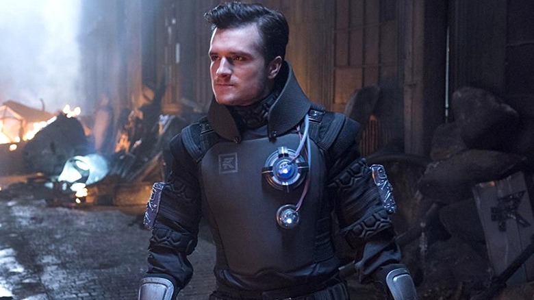Josh Futturman walking inside Biotic Wars on Future Man (2017)