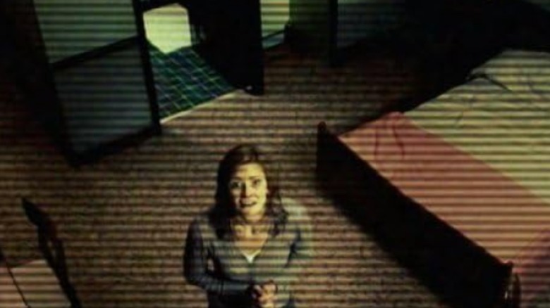 Janet looks at the camera on Persons Unknown (2010)