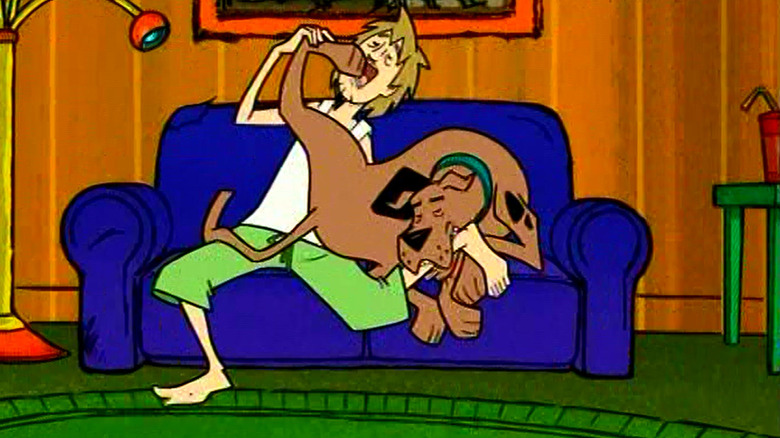 Shaggy and Scooby-Doo on a couch