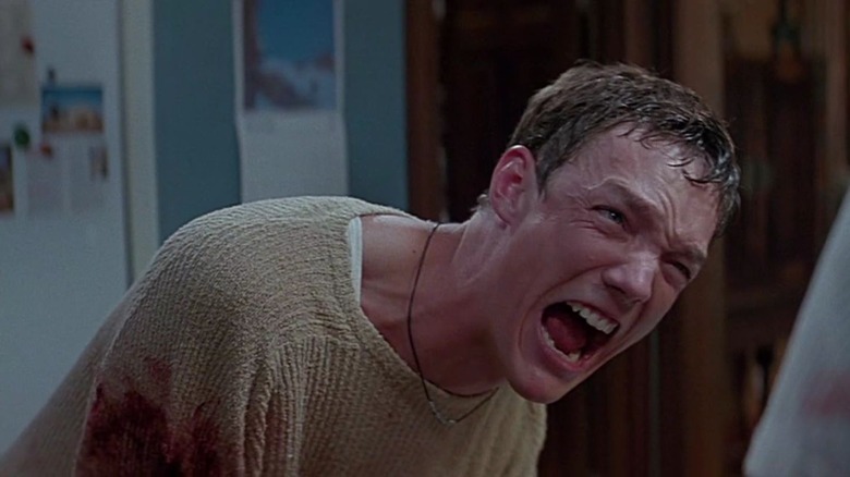 Stu Macher screaming in pain