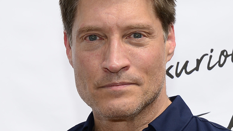 Sean Kanan posing at event