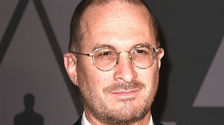 Darren Aronofsky wearing glasses