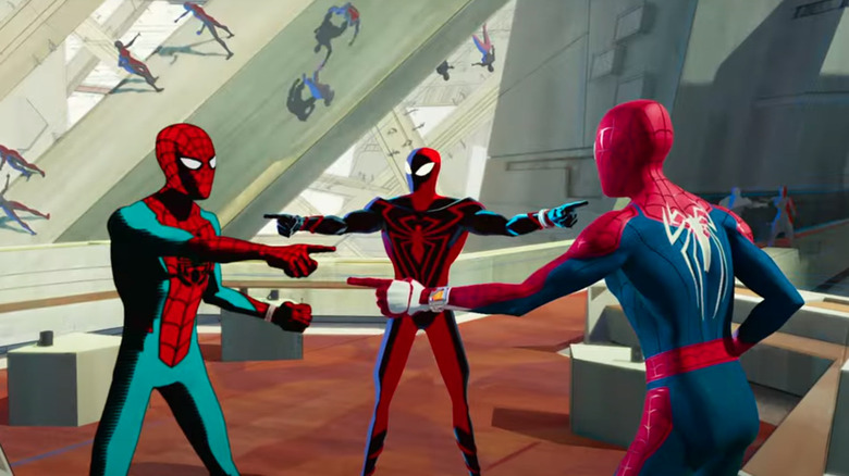Spider-Men pointing at each other