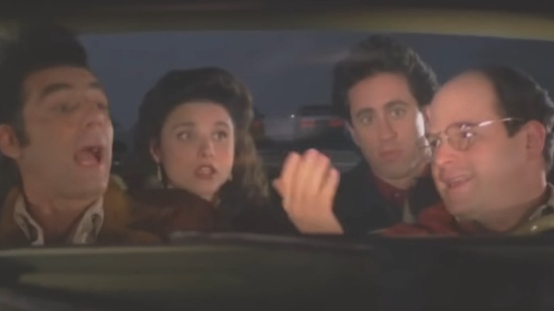 Jerry Elaine Kramer and George in a car