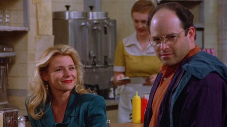 George speaking to a woman in "Seinfeld" (1989-1998)