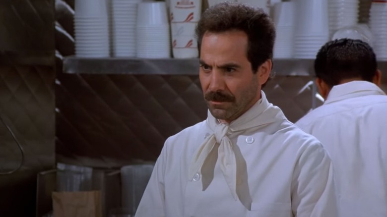 The Soup Nazi behind his counter in "Seinfeld" (1989-1998)