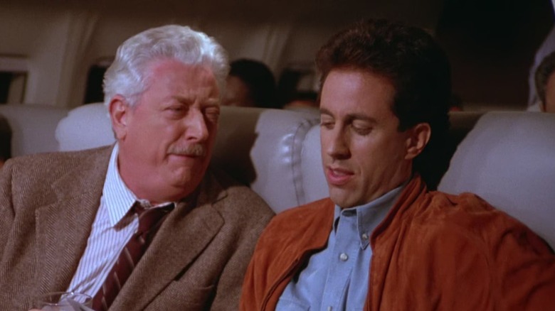 Seinfeld Jerry and dog owner on plane
