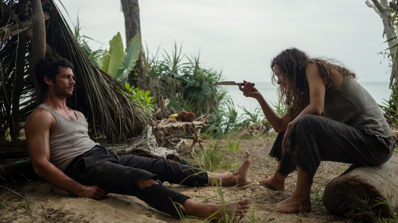 Linda pointing knife at Bradley