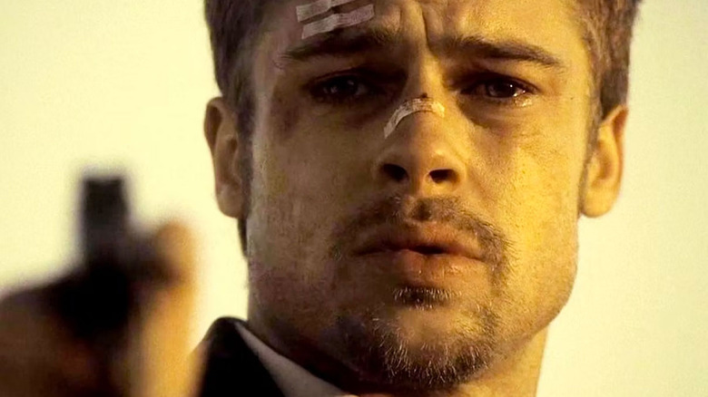 Mills holding the gun up in "Seven" (1995)