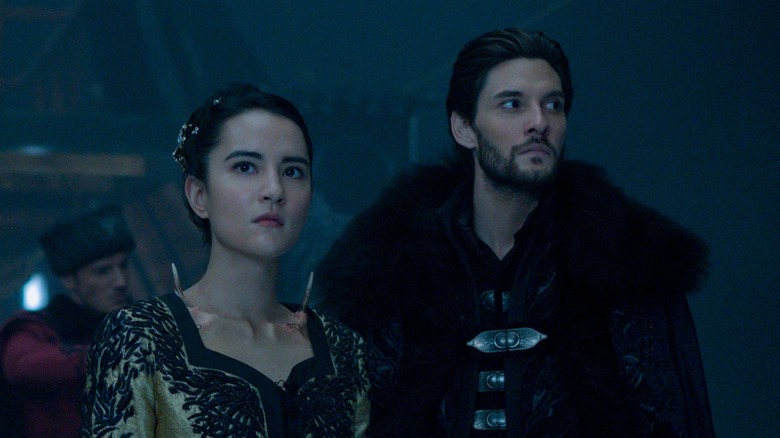 Jessie Mei Li and Ben Barnes standing together in Shadow and Bone