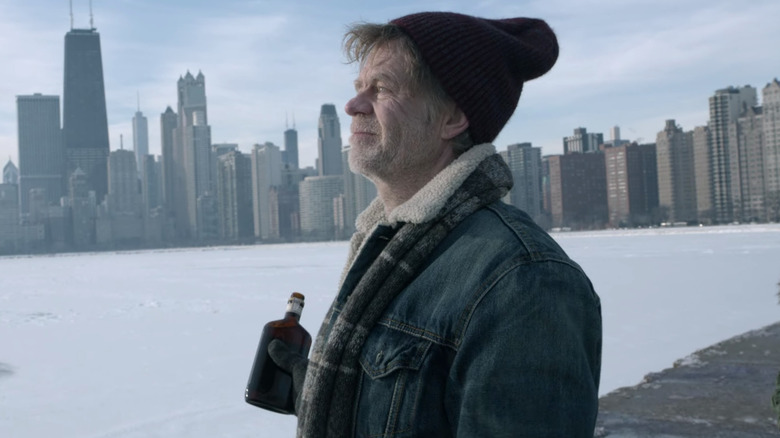 Frank standing in front of Chicago skyline