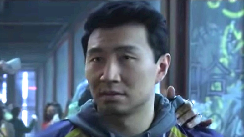 Simu Liu as Shang-Chi in gray hoodie