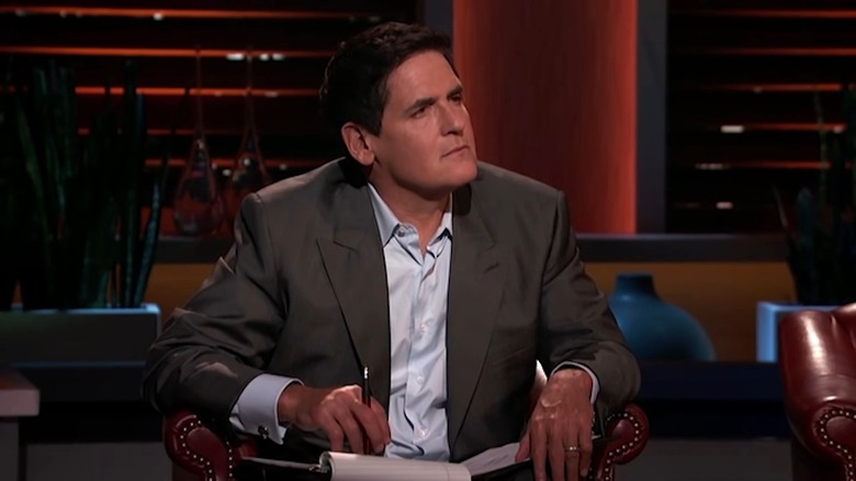 Mark Cuban wearing a jacket and listening to a pitch on Shark Tank Season 8