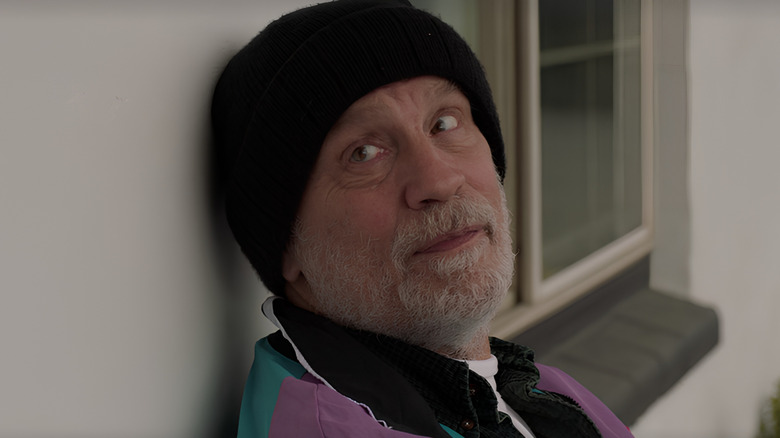 Ronald wearing beanie looking to the side