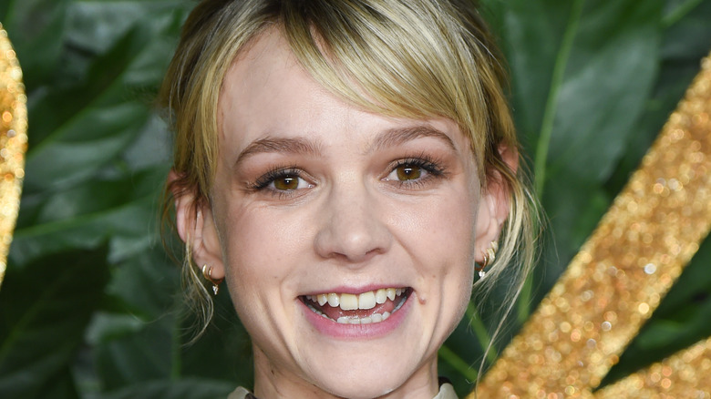 Carey Mulligan smiling at event