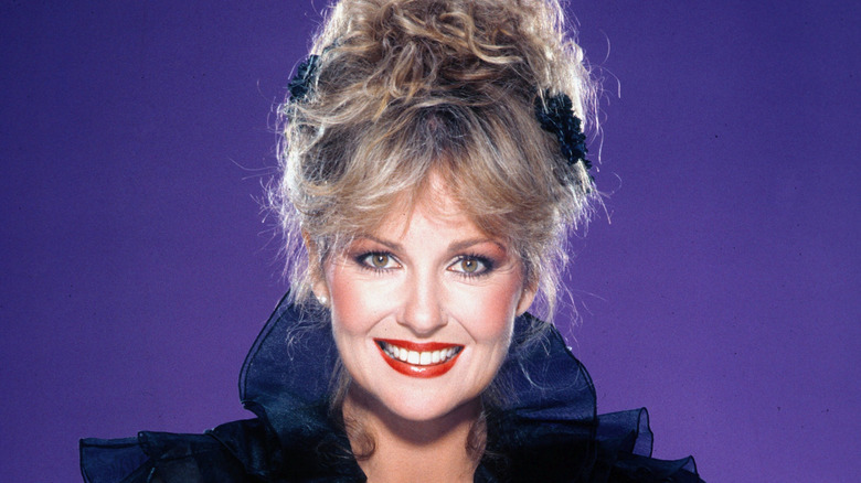 Shelley Fabares smiling and wearing her hair up