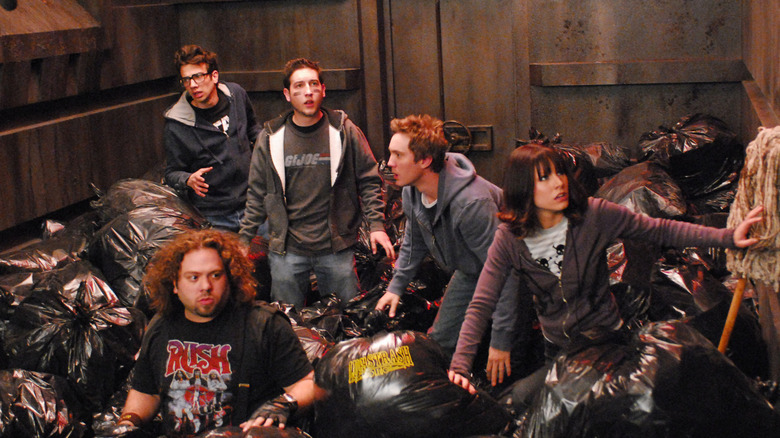 The leads of Fanboys trapped in a familiar garbage disposal (2009)