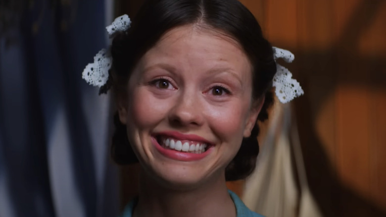 Pearl smiling in pain