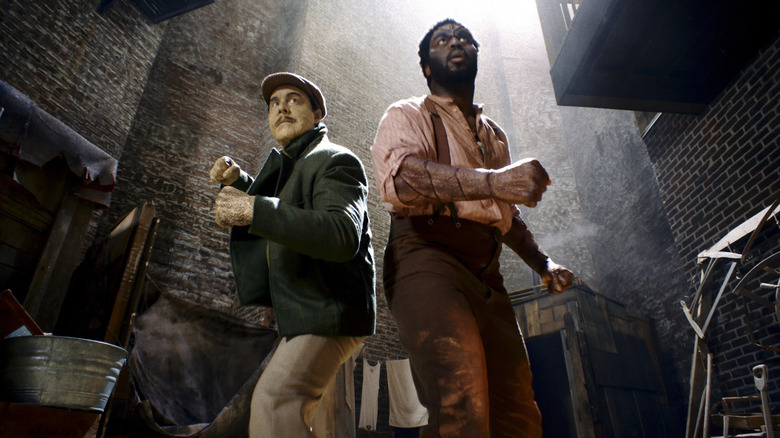Sandman and Tombstone make fists in an alley in "Spider-Noir" (in color)