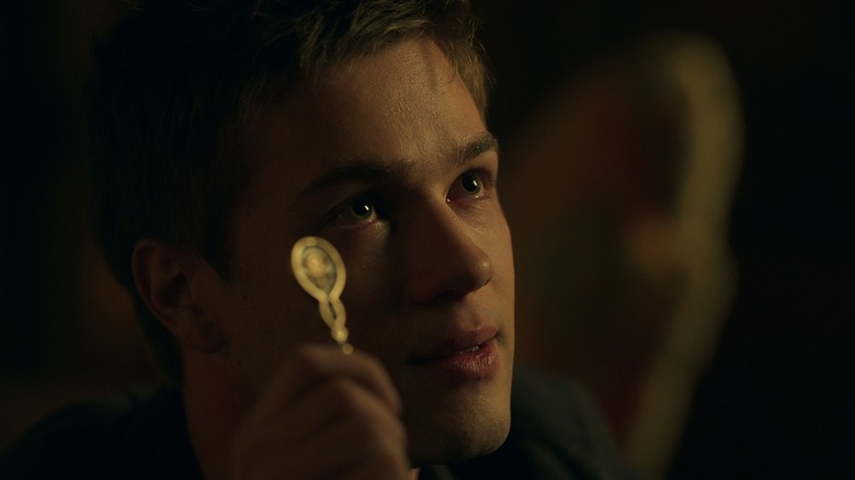 Tyler holding a key