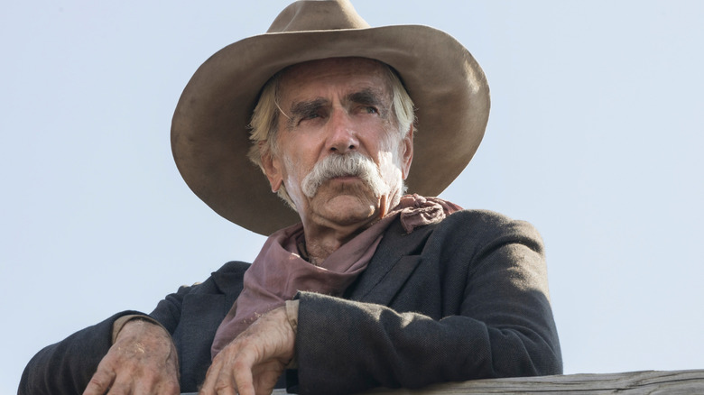 Shea Brennan leaning on a fence