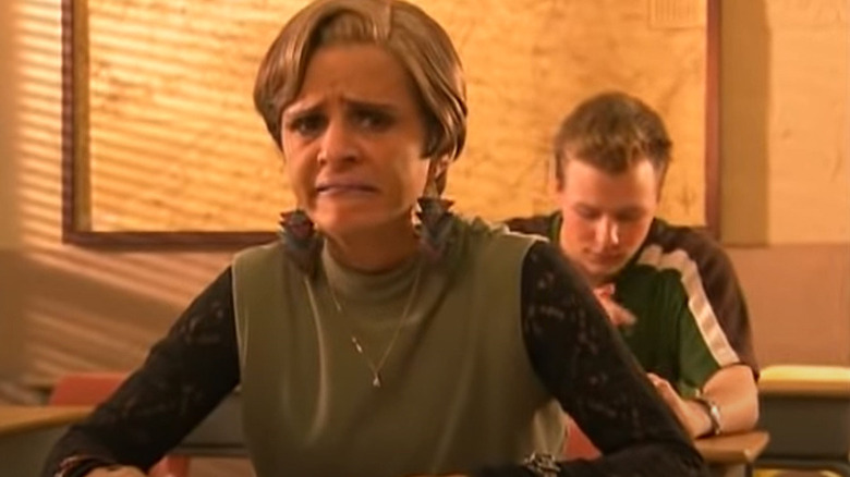 Jerri Blank grimacing at desk