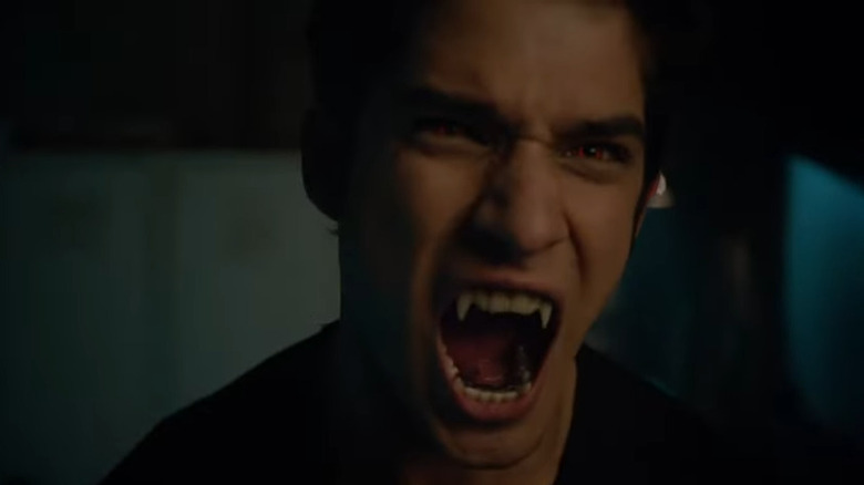 Scott roaring with werewolf fangs