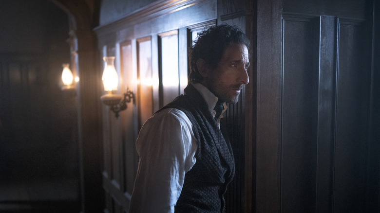 Adrien Brody looking suspicious in Chapelwaite