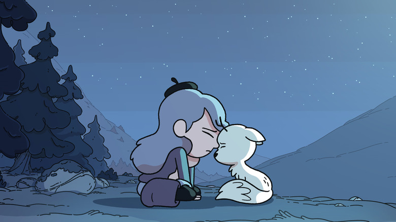 girl with animal at night