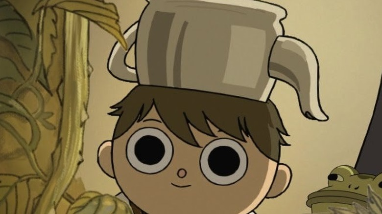 boy with teapot on head