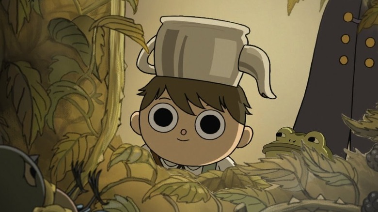 boy with teapot on head