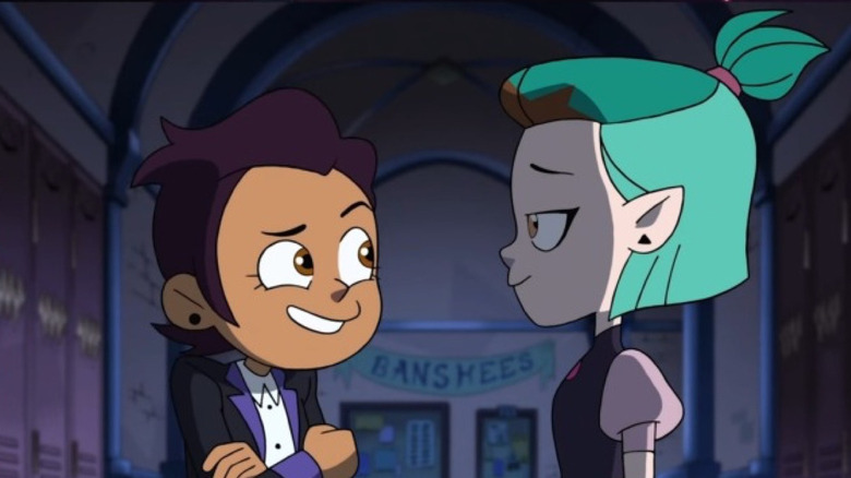 two girls in hallway