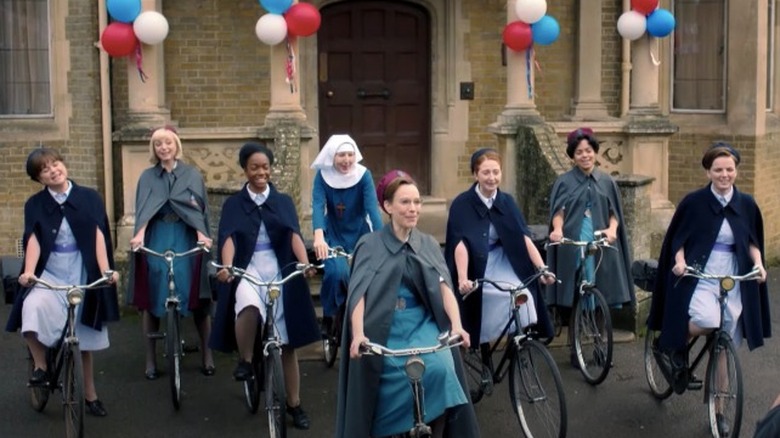 A line of women on bicycles