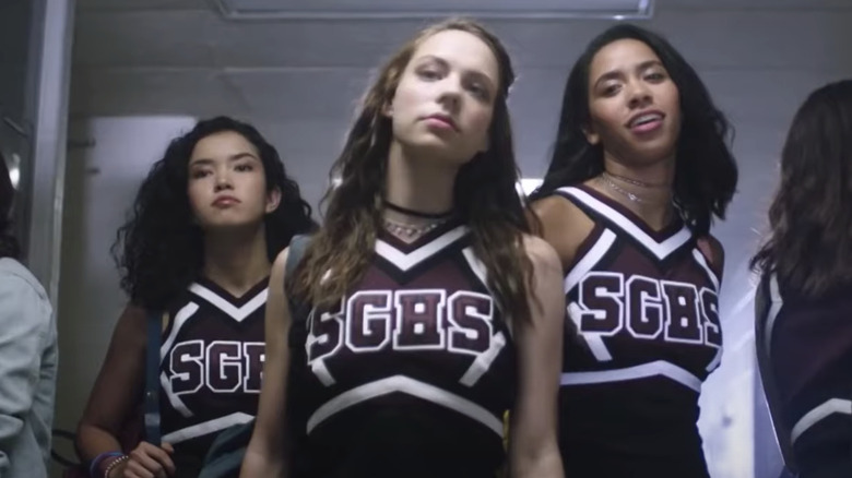 Beth and Addy walking down the hall in Dare Me