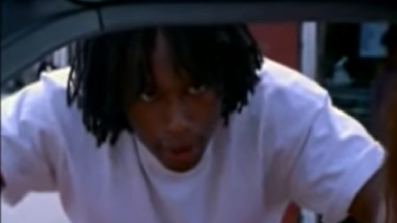 DeAndre McCullough leans in car