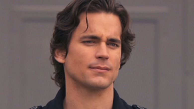 White Collar Neal smirks