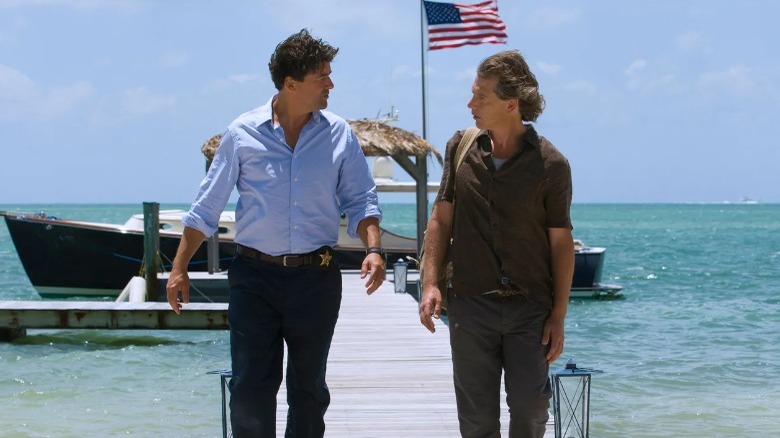 Kyle Chandler walking with Ben Mendelsohn