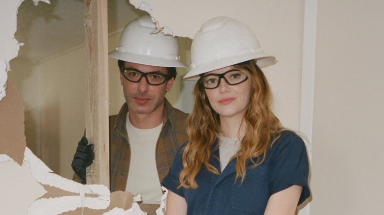 Asher and Whitney wearing hard hats