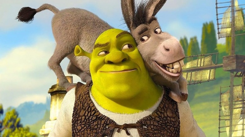 Donkey sits on Shrek's shoulders in 