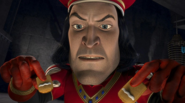 Lord Farquaad holding Gingy's legs