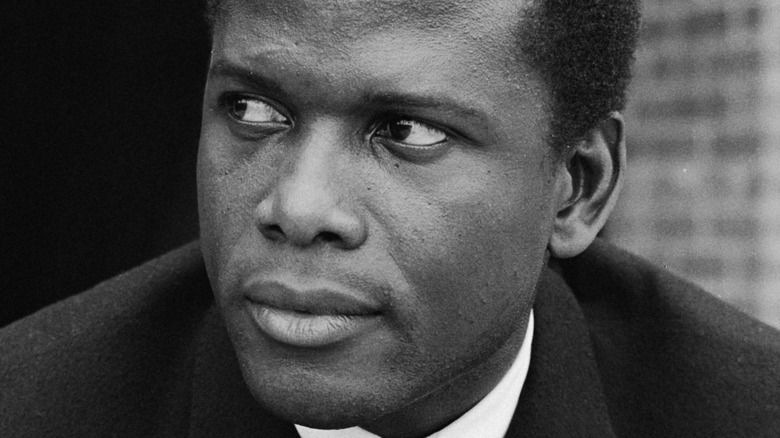 Sidney Poitier staring