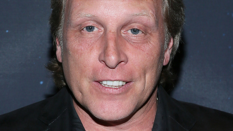 Sig Hansen black jacket smiling