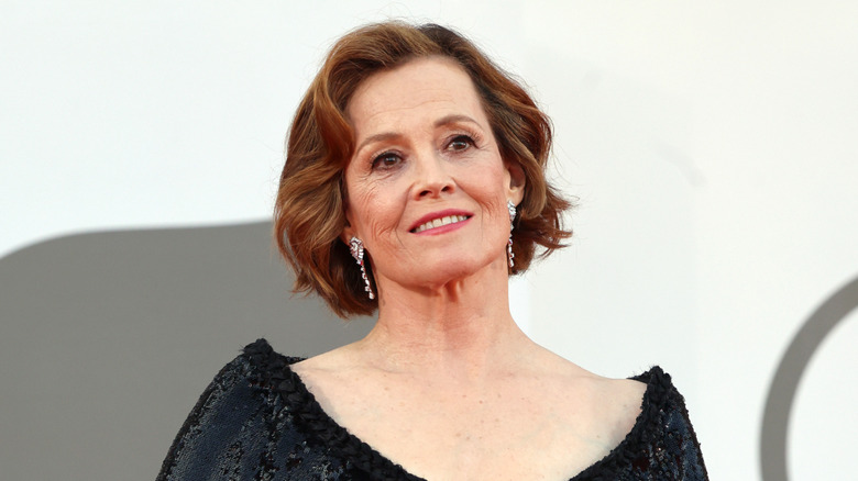 Sigourney Weaver posing at Venice Film Festival