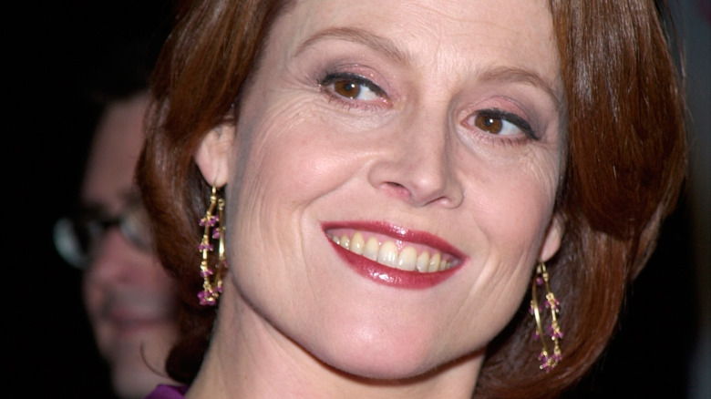 Sigourney Weaver smiles