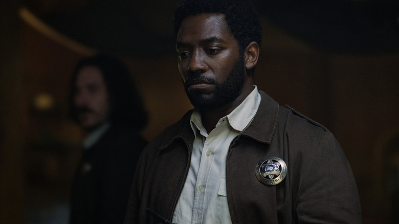 Deputy Billings frowning in "Silo."