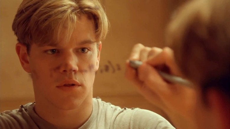 Will Hunting crunches numbers on a mirror