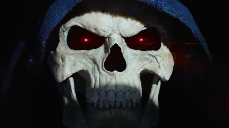 Skeletor glares with glowing eyes.