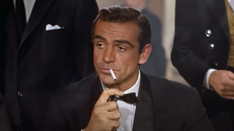 James Bond at the table in "Dr. No" (1962)