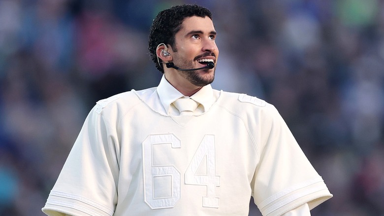 Bad Bunny smiling during the Super Bowl halftime show